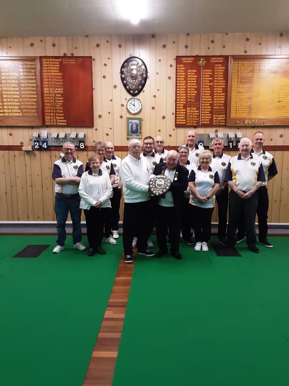 The club with a winter league shield indoors