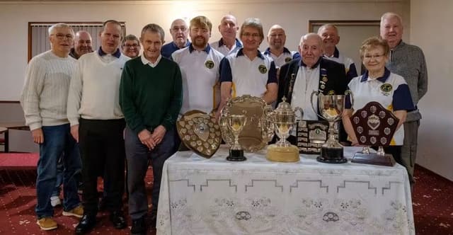 Some of the silverware won by Cullen Bowling Club